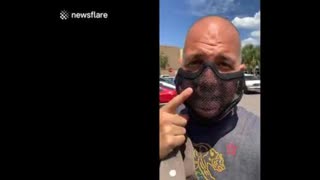 Man wears a mesh mask to prove mandatory masks in Florida is not about protection but compliance