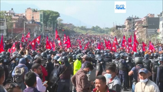 Clashes in Nepal: crowd faces Riot Police in Kathmandu demanding restoration of the monarchy