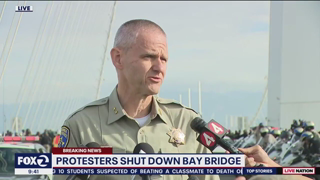 Pro-Palestinian protesters throw their car keys into the Bay Bridge