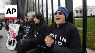 DC protesters calling for a ceasefire in Gaza chain themselves to White House fence