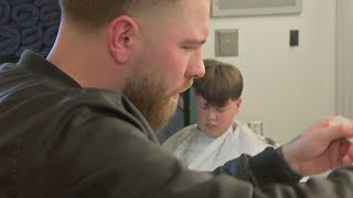 Barber opens free barbershop in Boston middle school