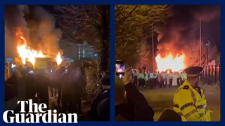 Far-right protesters set fire to police van outside Knowsley asylum seeker hotel