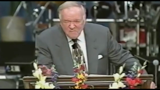 Kenneth Hagin pretends he is about to preach; acts demon-possessed instead.