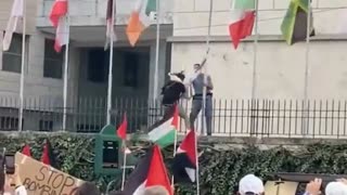 The Israeli flag is torn down in front of the United Nations building in Rome