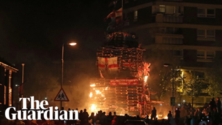 Protesters burn bonfire in northern Belfast after clashing with police