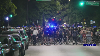 Protesters gather in front of mayor's home