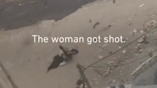 "Israeli" sniper shooting at displaced civilians raising white flags