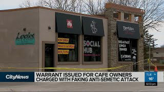 Warrant issued for cafe owners charged with faking anti-Semitic attack