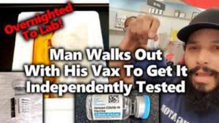 Man Walks Out The Door With A Vile Of The Vaccine. He Is Going To Send It To A Lab To Get Tested.