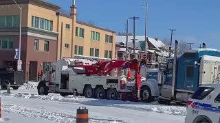 The towing of trucks has begun at the Ottawa protest