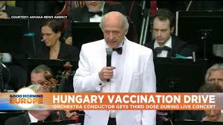 Hungarian-Jewish Conductor Promotes Vaccination by Receiving a Jab While Performing