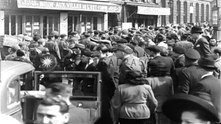 Group of American and British prisoners are marched through streets under German ...HD Stock Footage