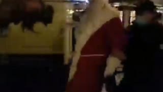 NEW - Police arrested "Santa Claus" today at a Christmas market in Germany not wearing mask