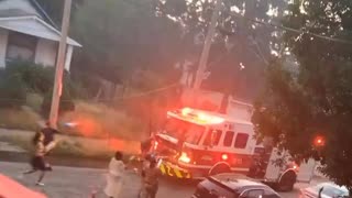 Negros Stop Fire Fighters From Reaching Burning Apartment Complex