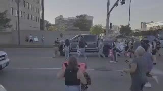 Baby killers try to stop some dude's truck with their bodies, but he keeps on going!