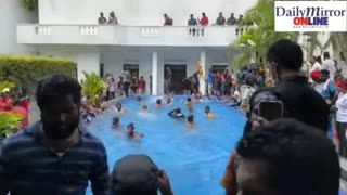 Sri Lanka Protestors taking a dip in the pool at Presidentâ€™s House